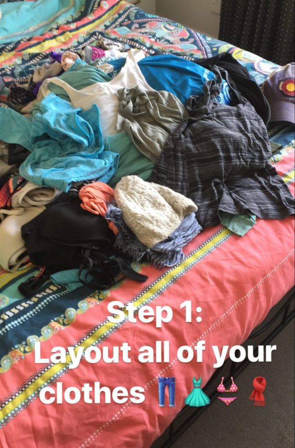 All my clothes laid out on the bed completing Category 1 of the KonMari method of going through your clothes. 
